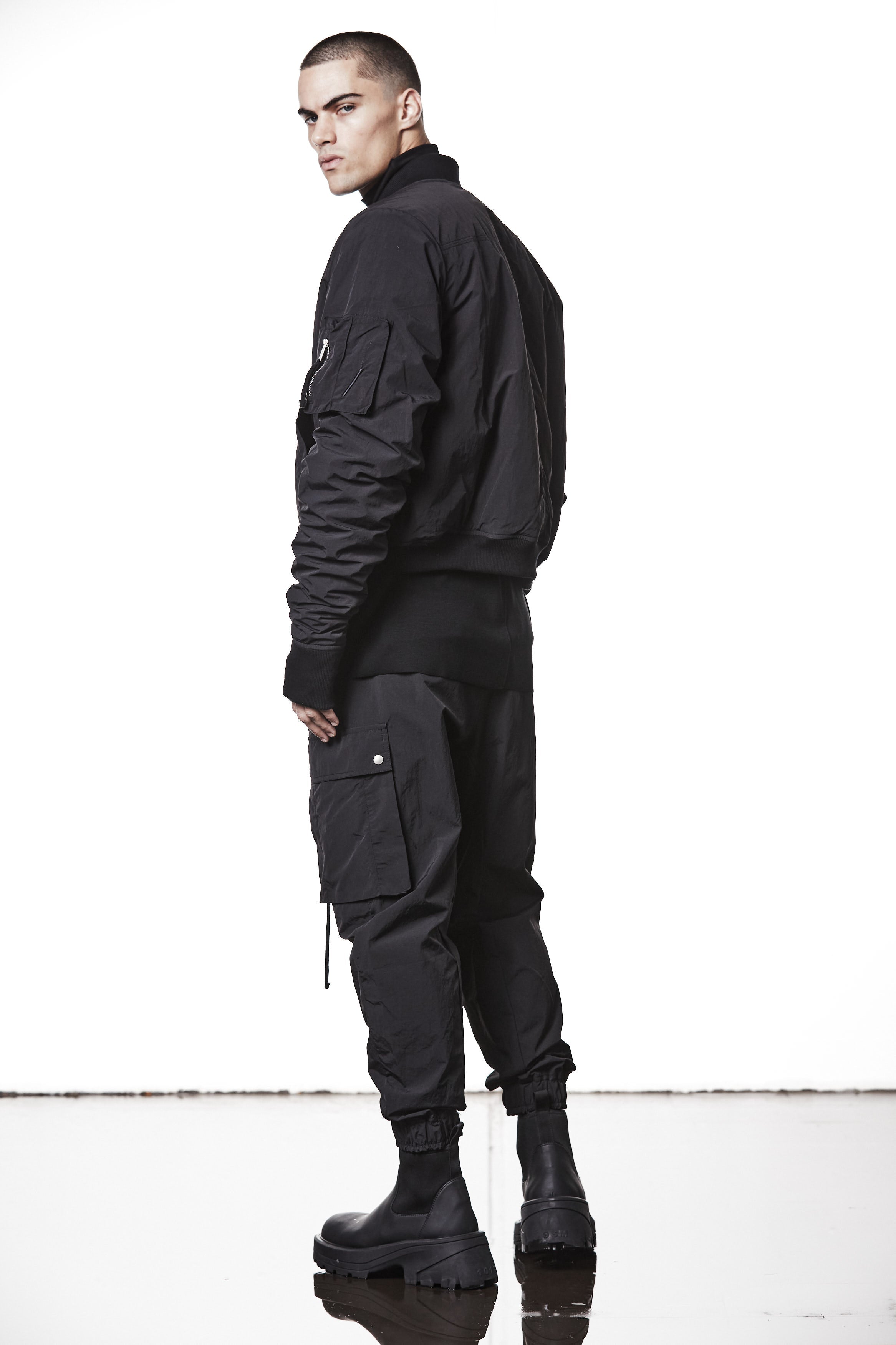 M J 75 Black Bomber Jacket – Zip-Up with Ribbed Hem and Sleeve Pocket Black Man THOM KROM