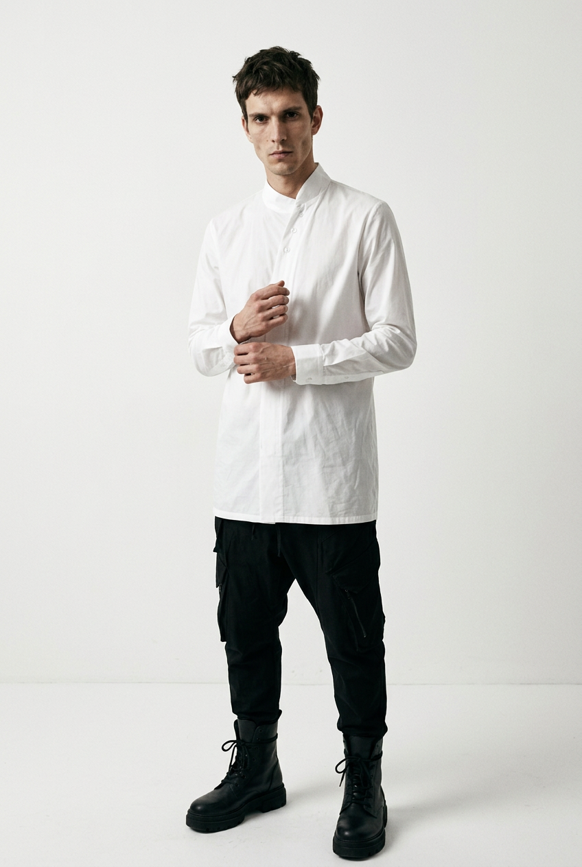 LA HAINE INSIDE US LM226 white long cotton stretch shirt — three-quarter view adjusting the cuff