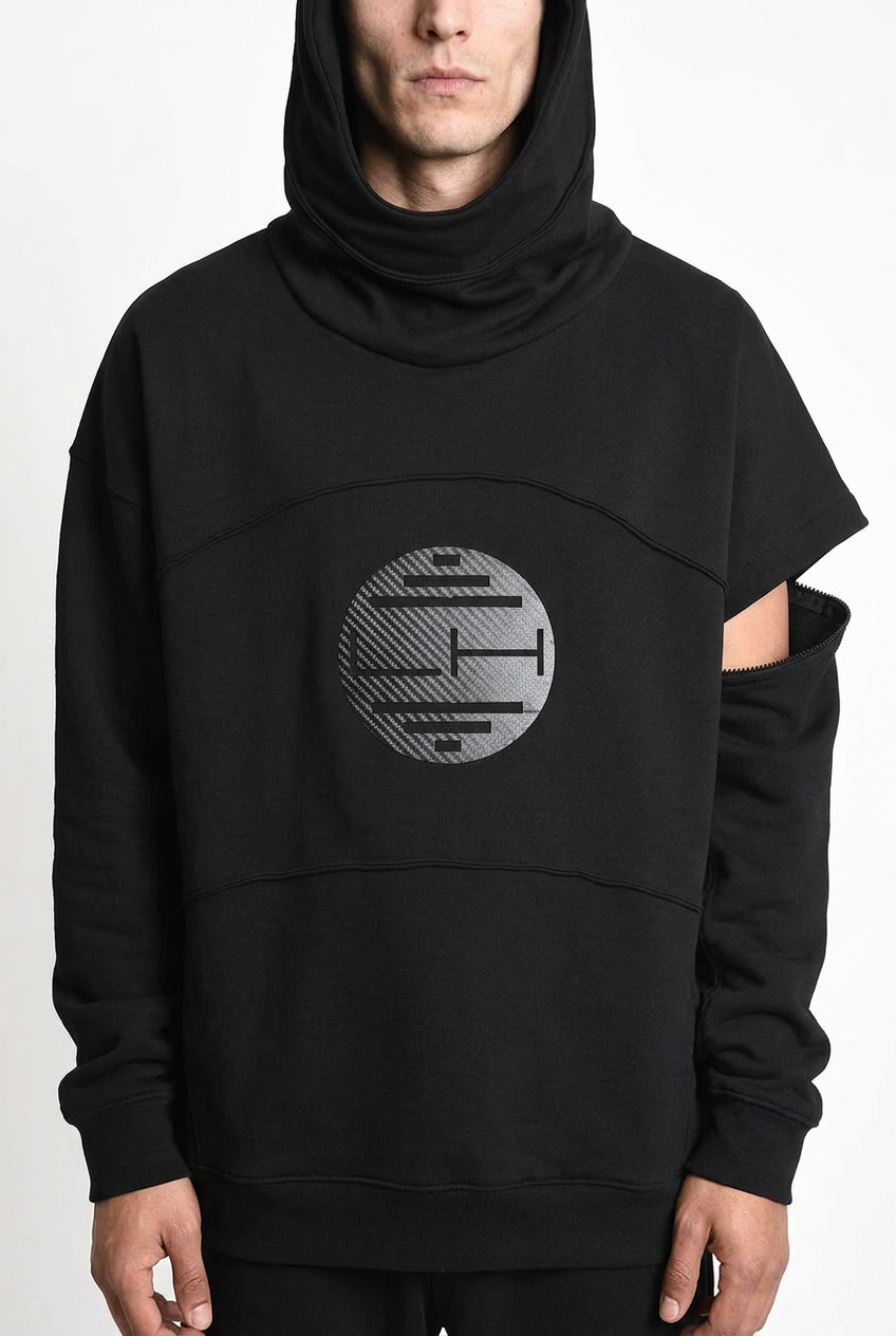LA HAINE INSIDE US M1334 hoodie in black — circular chest print and sleeve attachment detail on male model