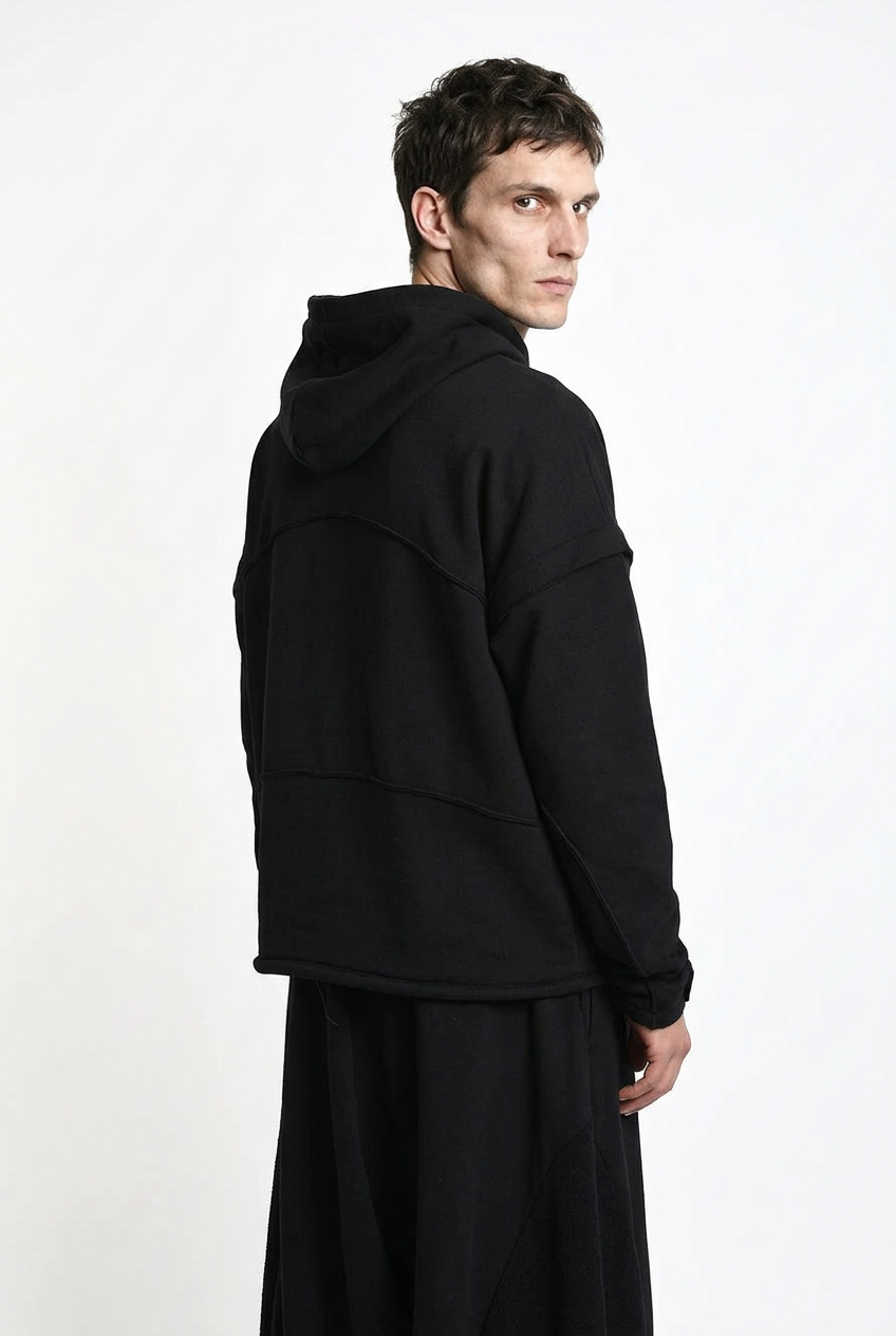 LA HAINE INSIDE US M1334 hoodie in black — over-the-shoulder back view on male model