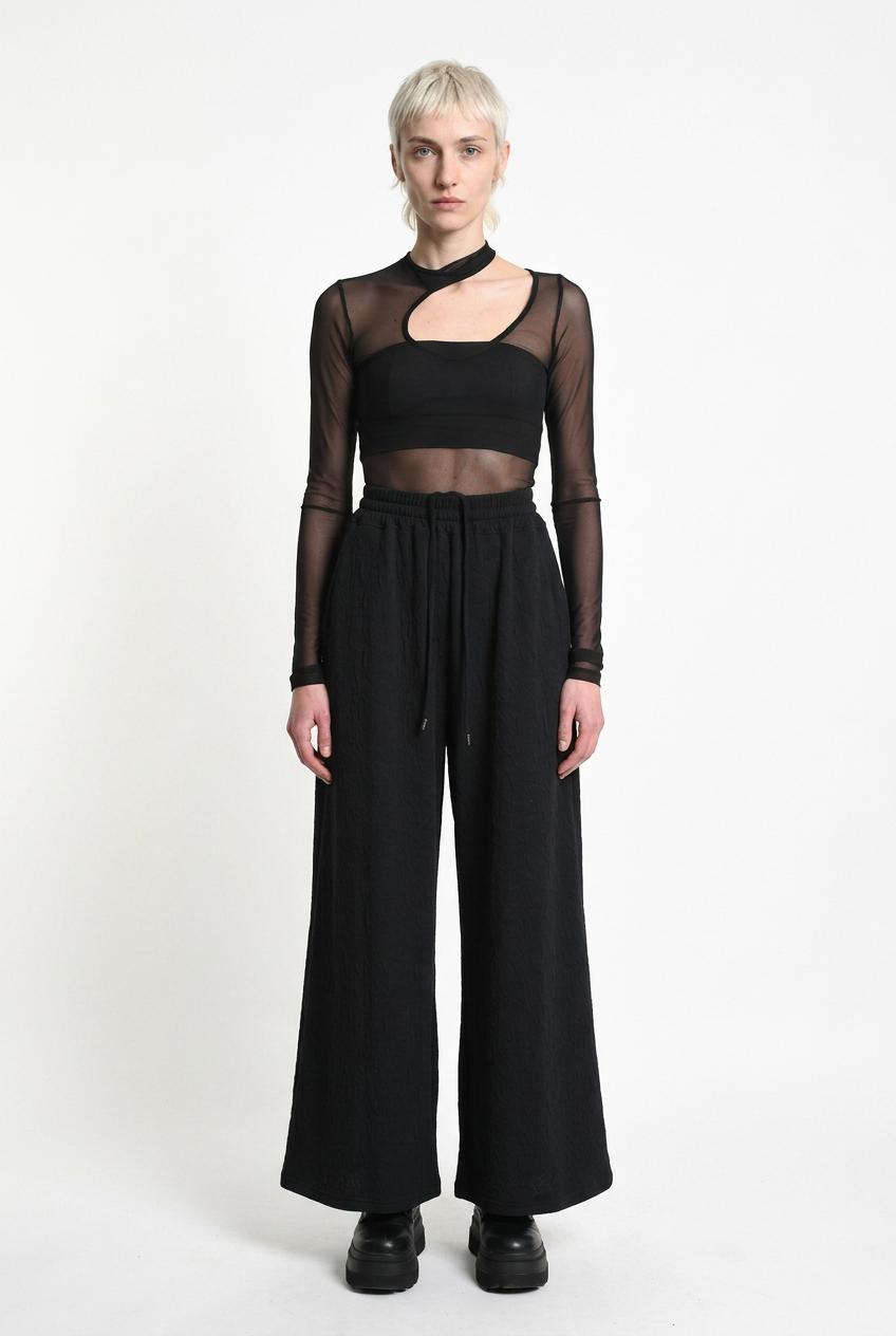 LA HAINE INSIDE US W5451 black embossed fleece palazzo trousers, straight front studio view
