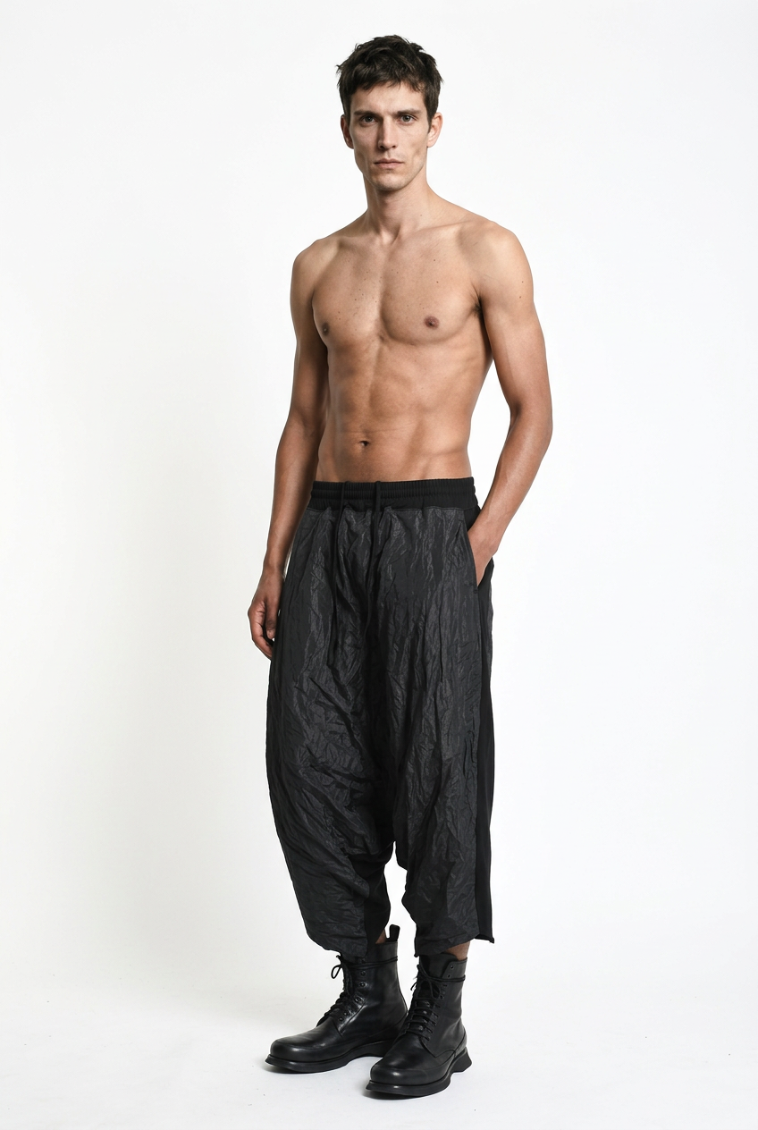 LA HAINE INSIDE US W5488 black baggy drop-crotch trousers, male model, relaxed three-quarter view