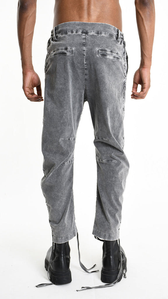 A33B M103325 TROUSER in marmorized grey, showcasing back view with elastic waist and design details.