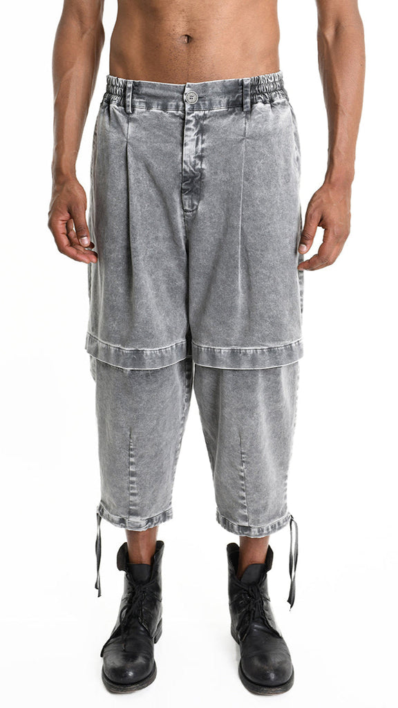 A33B M104925 TROUSER in marmorized grey with elastic waist and buttoned front leg.