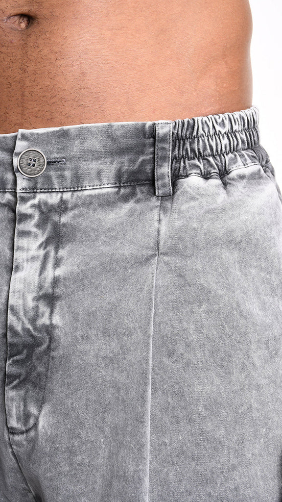 A33B M104925 TROUSER in marmorized grey with elastic waist and buttons.