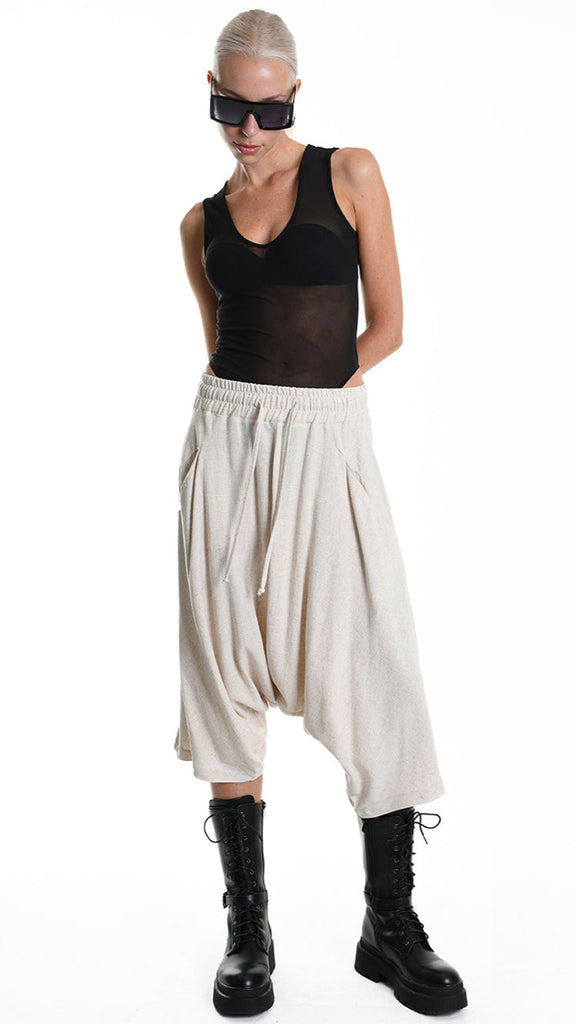 Unisex A33M M101125 pants in ecru, low crotch, elastic waist, viscose linen blend.