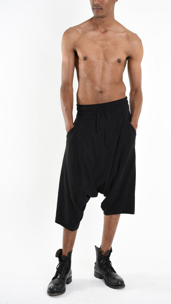 Unisex black A33M M101125 pants in viscose linen blend, featuring low crotch and elastic waist.