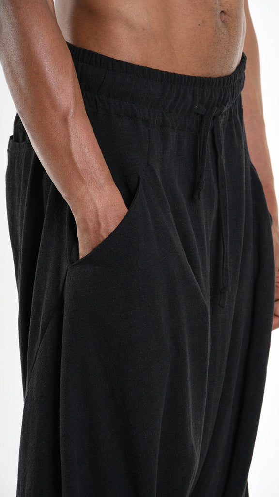 A33M M101125 unisex black pants made of viscose linen blend with elastic waist and pockets.