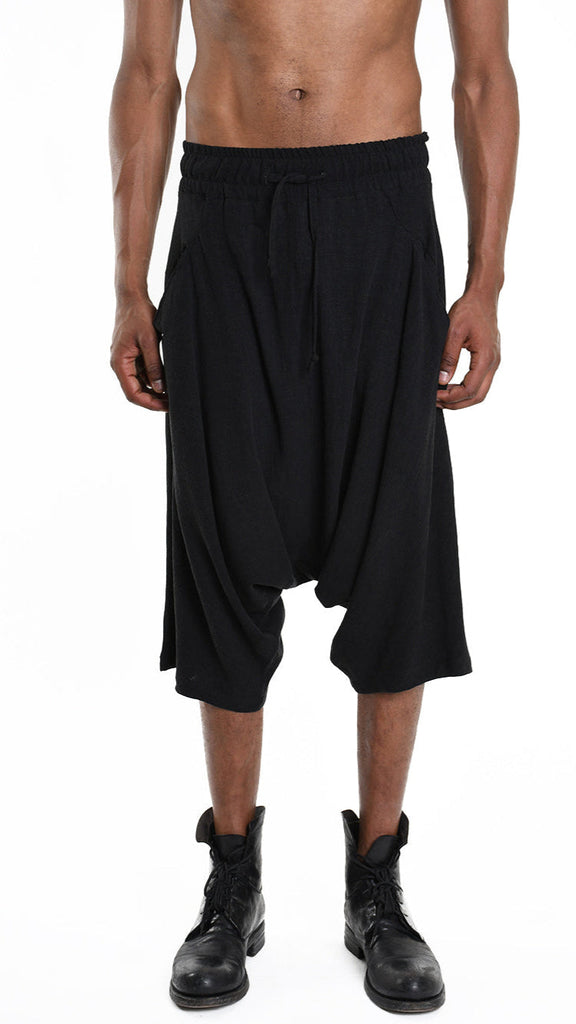 A33M M101125 unisex black pant shorts, viscose linen blend with low crotch and elastic waist, made in Italy.