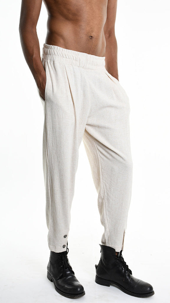 A33M M101225 Trouser in ecru viscose linen, elastic waist, and buttoned cuffs.