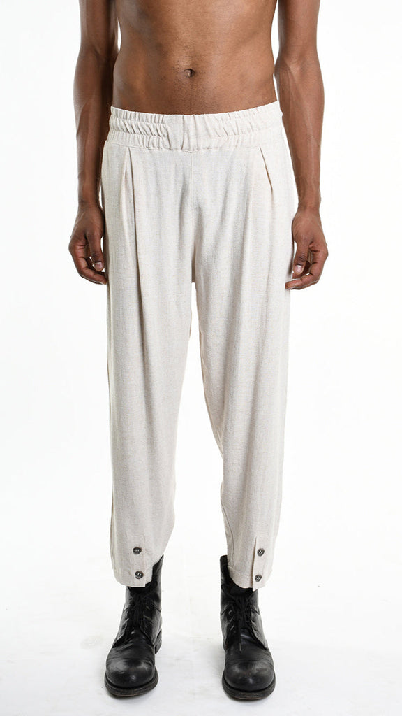 A33M M101225 Trouser in ecru with elastic waist, pinces, and button details.