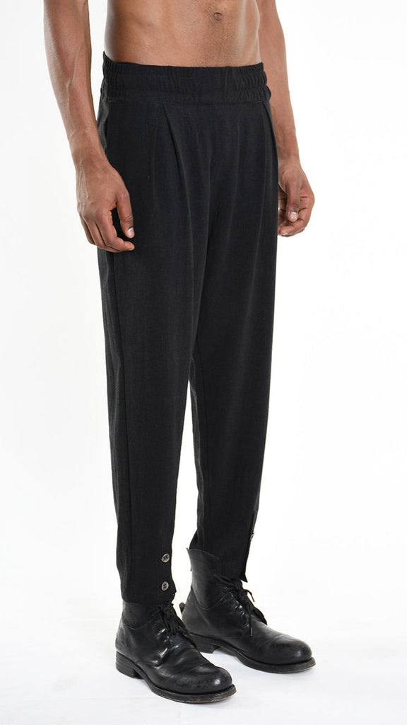 A33M M101225 TROUSER in black viscose linen with elastic waist and button detail.