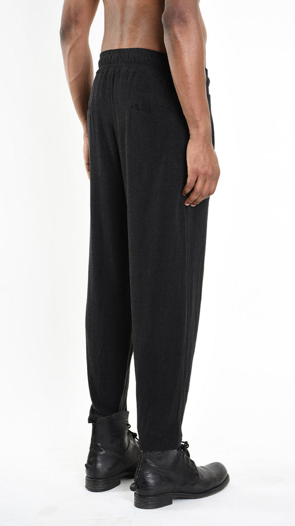 A33M M101225 TROUSER in black viscose linen with elastic waist and button detailing.