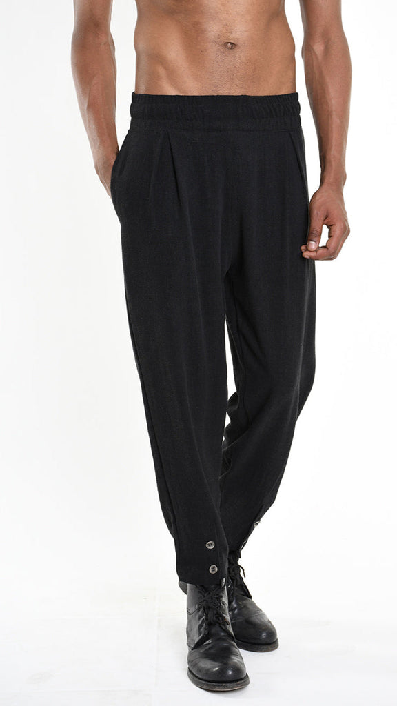 A33M M101225 TROUSER in black viscose linen with elastic waist and button detailing.