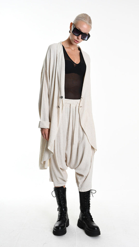 A33M M101325 CARDIGAN in ecru, unisex viscose-linen blend, asymmetrical design, button closure.