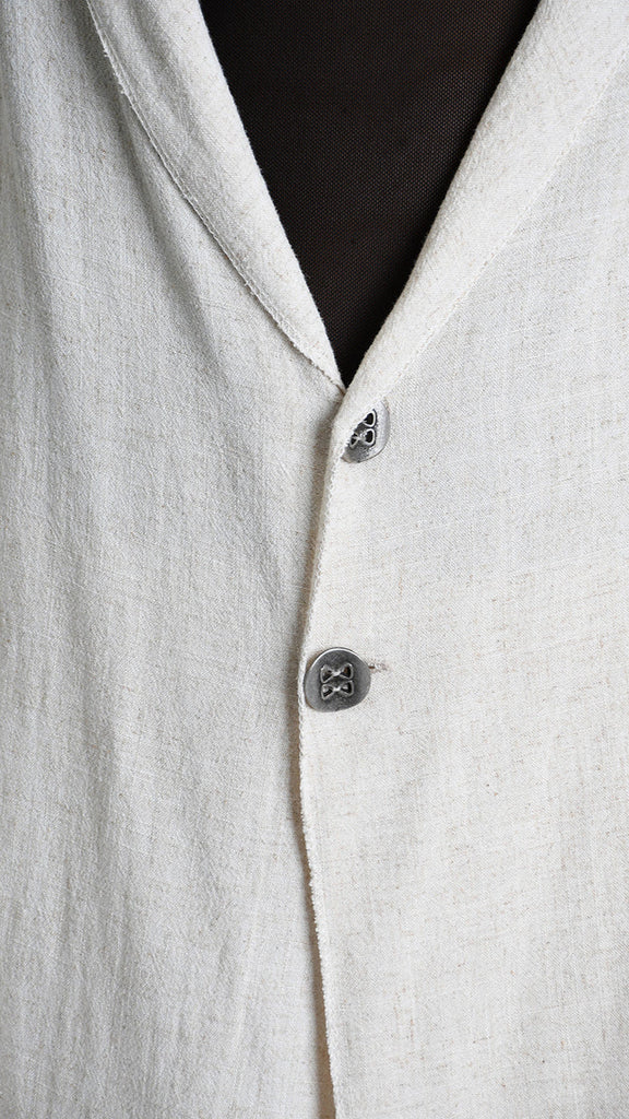 A33M M101325 CARDIGAN in ecru, unisex viscose linen blend with button closure.