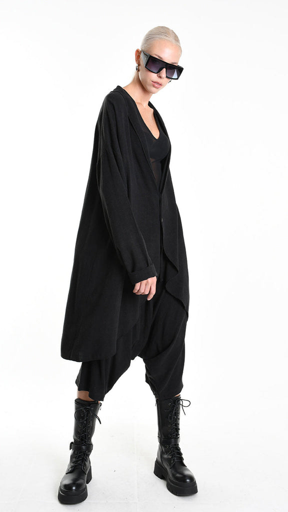 Unisex A33M M101325 cardigan in black with asymmetric design.