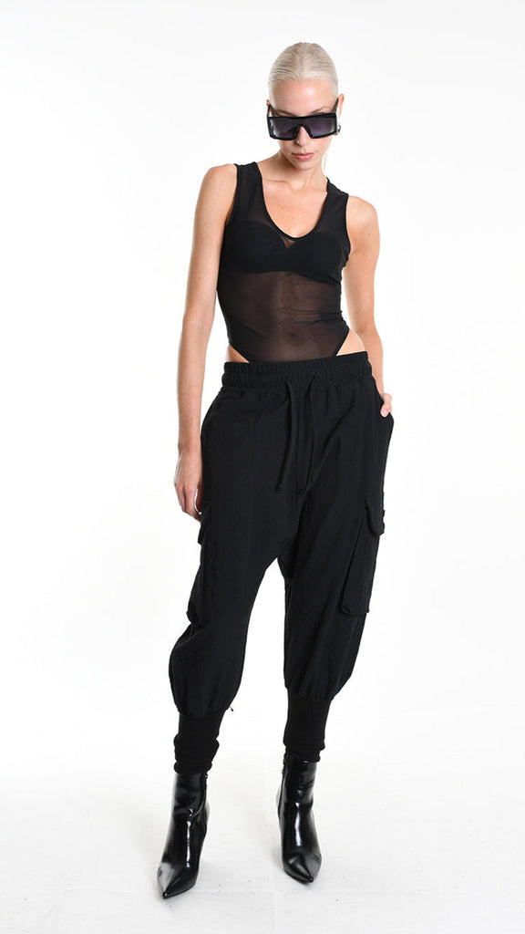 A33M M101525 TROUSER baggy cotton jacquard unisex in black with elastic waist, side and leg pockets.