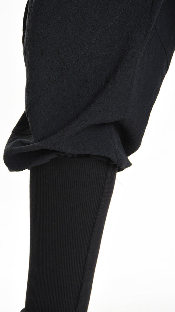 A33M M101525 baggy cotton jacquard trouser in black with ribbed bottom detail.