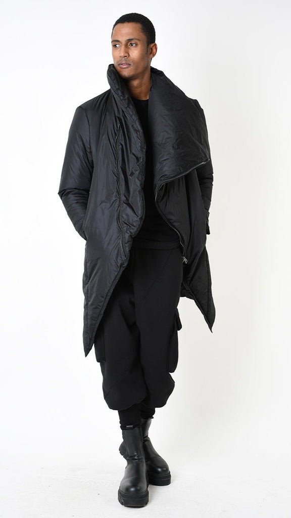 Black nylon down jacket with padded design and asymmetric style.