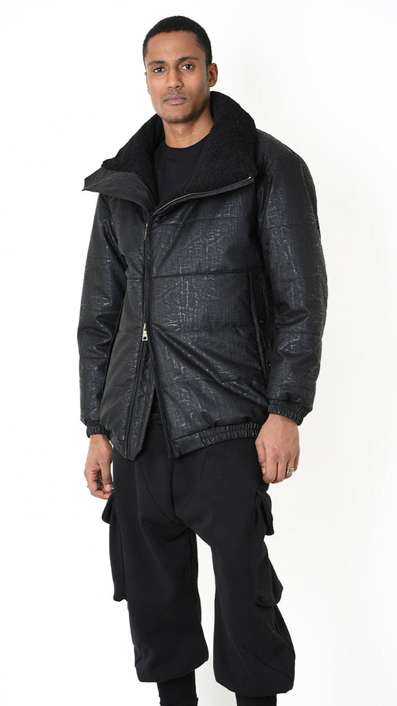 Jacket in faux leather with graphite effect, faux fur lining, and zip closure.