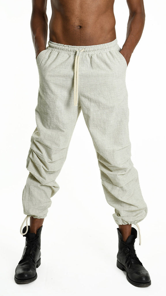 A33P M105325 TROUSER in Ecru with elastic waist, pockets, and bottom coulisse.