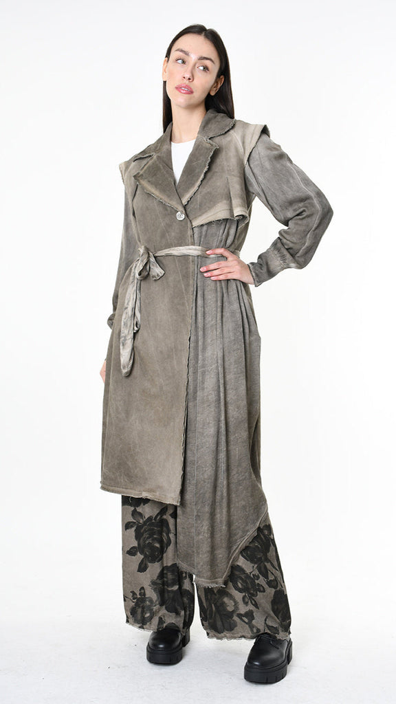 A39B SM45125 Trench in cotton gabardine and viscose satin, asymmetrical design, available in green, Tuscany, grey, and black.