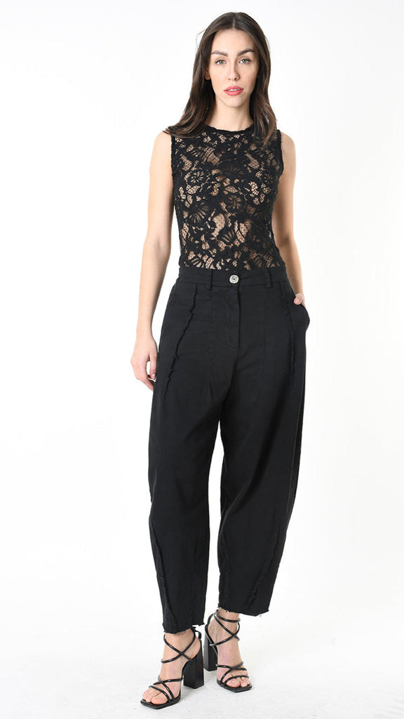 A39B SM506 TROUSER wide fit gabardine in black modeled on woman.