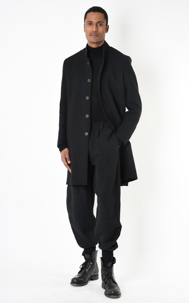 A33P regular coat in Nero black wool blend with button closure, modeled.