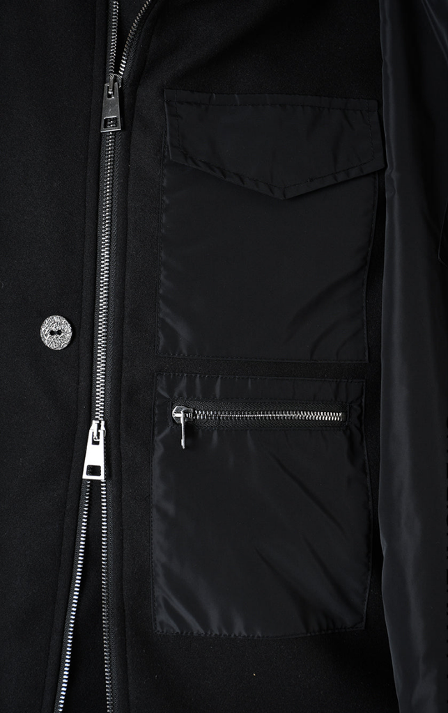 A33B LM18525 COAT with asymmetrical design, nylon insert, and pockets in black.