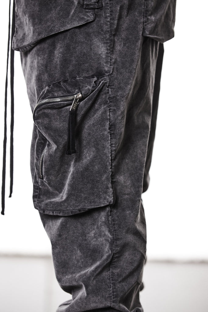 M P 21 – Used Grey Men’s cargo trousers in washed grey with zip/flap pockets, drawstring waist, and elastic cuffs THOM KROM