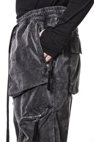 M P 21 – Used Grey Men’s cargo trousers in washed grey with zip/flap pockets, drawstring waist, and elastic cuffs THOM KROM