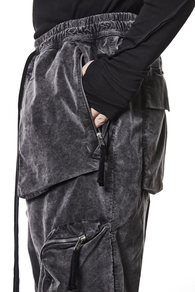 M P 21 – Used Grey Men’s cargo trousers in washed grey with zip/flap pockets, drawstring waist, and elastic cuffs THOM KROM