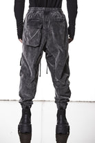M P 21 – Used Grey Men’s cargo trousers in washed grey with zip/flap pockets, drawstring waist, and elastic cuffs THOM KROM