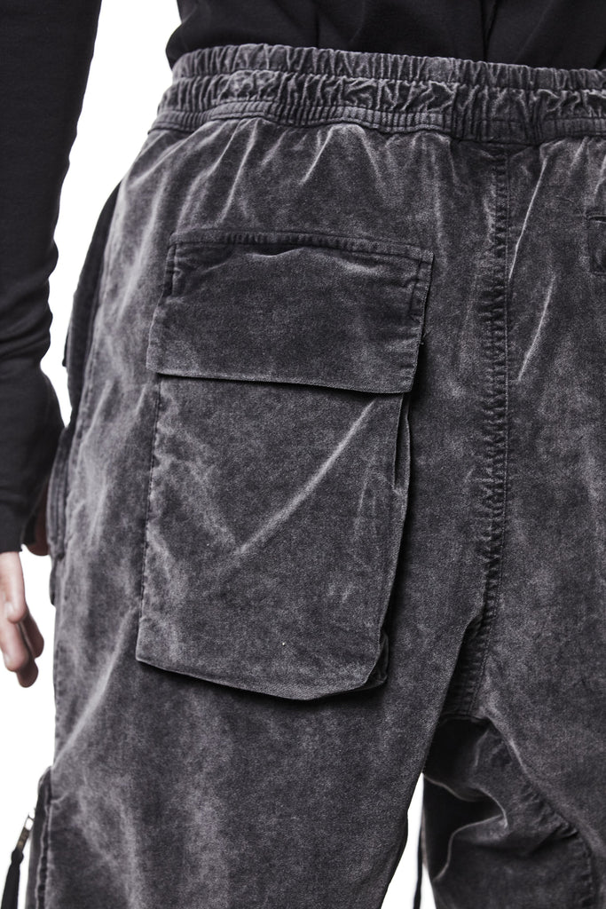 M P 21 – Used Grey Men’s cargo trousers in washed grey with zip/flap pockets, drawstring waist, and elastic cuffs THOM KROM