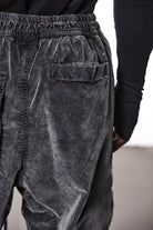M P 21 – Used Grey Men’s cargo trousers in washed grey with zip/flap pockets, drawstring waist, and elastic cuffs THOM KROM