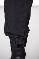 M P 26 Black Cargo Pants – Multi-Pocket Design with Elastic Waist and Cuffs Black Man THOM KROM