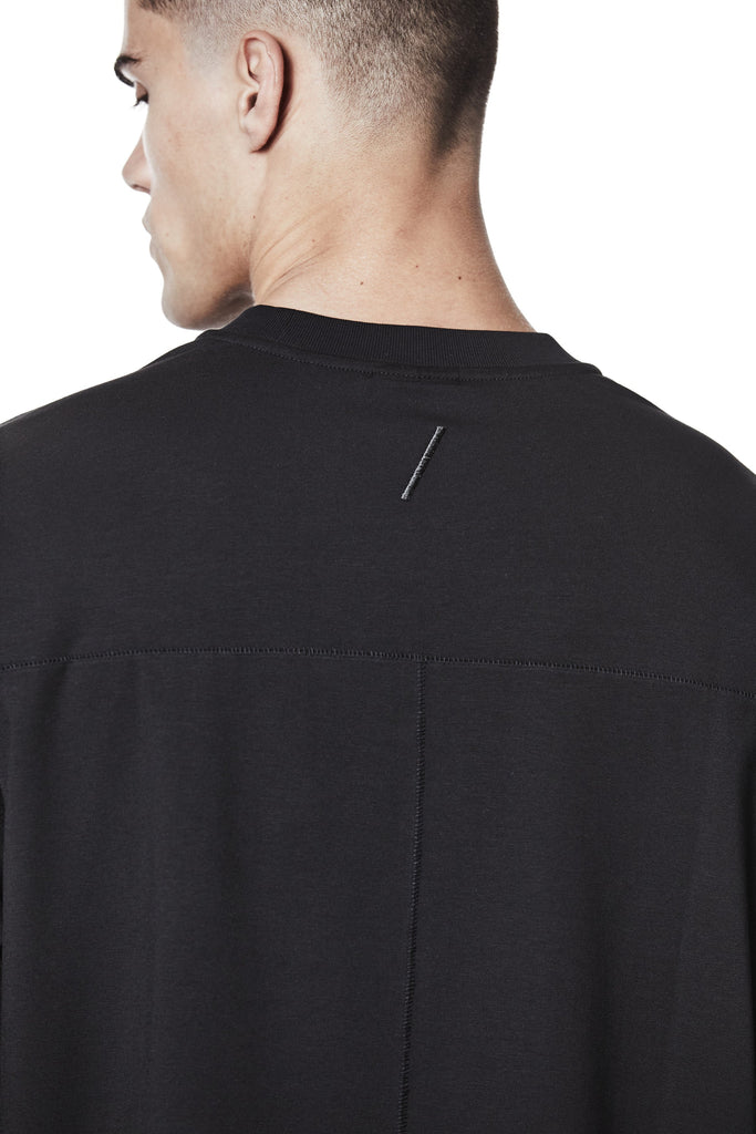 M TS 882_black – Oversized short-sleeve T-shirt in black with dropped shoulders, straight hem, and signature back stitch - Man THOM KROM
