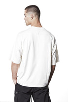 M TS 882 Cream – Oversized short-sleeve T-shirt in black with dropped shoulders, straight hem, and signature back stitch - Man THOM KROM