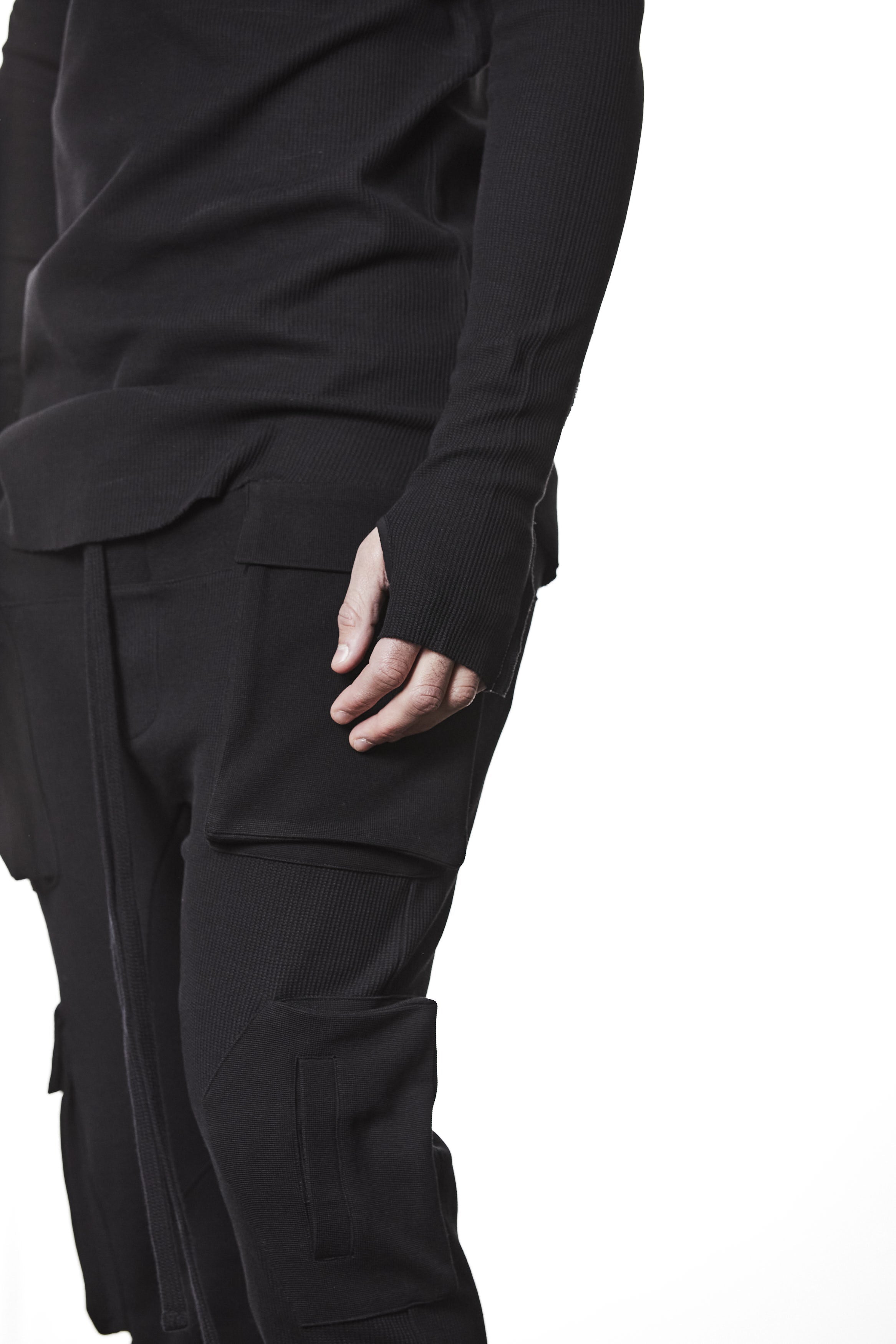 M TS 898 Black Fitted Long-Sleeve Top – Ribbed Texture with Exposed Seams and Thumbholes Black Man THOM KROM