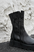 Double-zip and leather detail