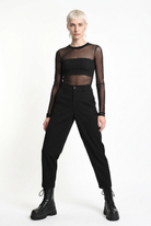 LA HAINE INSIDE US black carrot-fit trousers, wide-stance front view