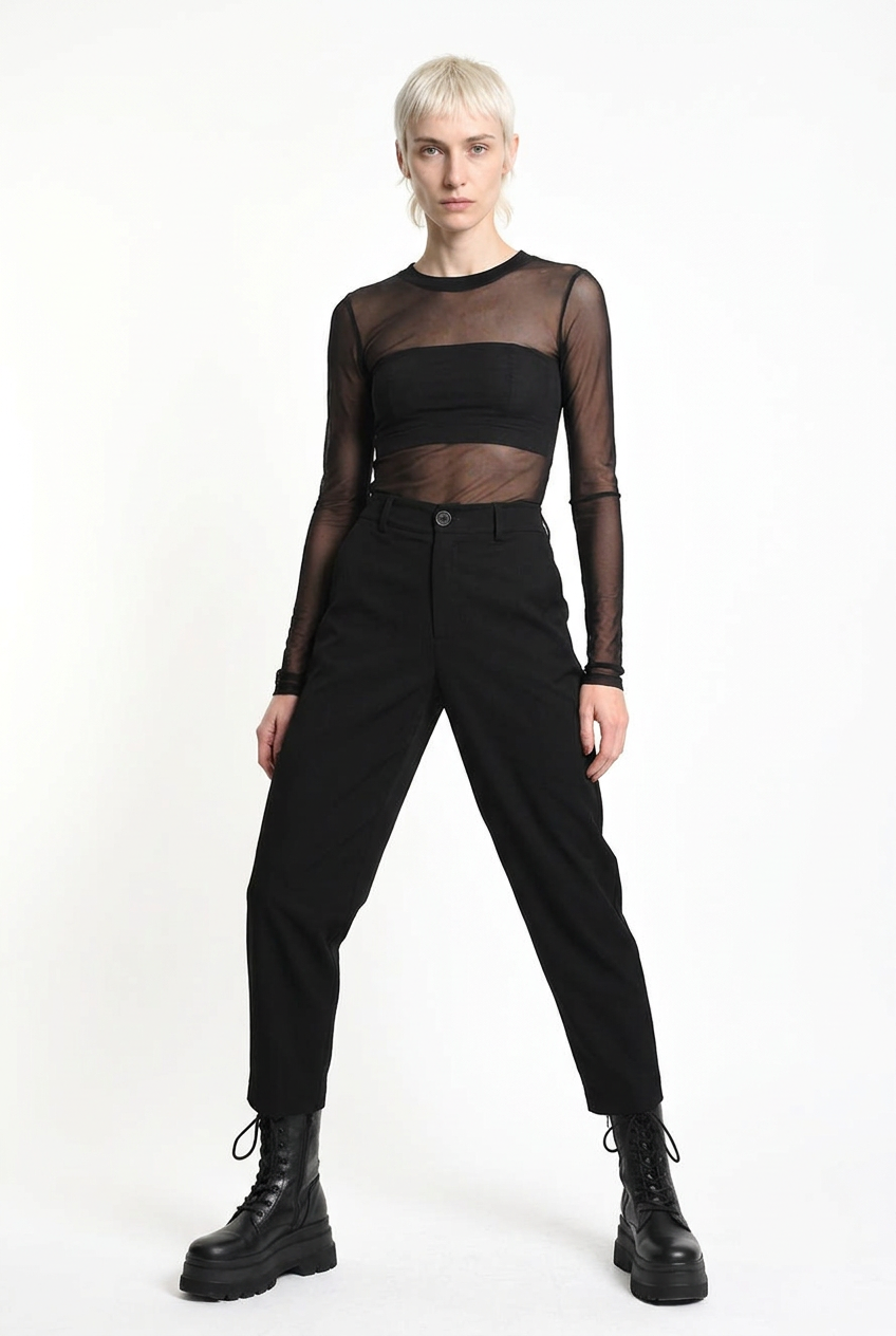 LA HAINE INSIDE US black carrot-fit trousers, wide-stance front view