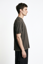LA HAINE INSIDE US M1295 Mud cold-dyed cotton T-shirt, side profile showing oversized fit
