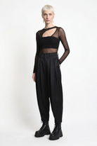 LA HAINE INSIDE US W5469 satin balloon trousers in black — three-quarter front editorial view