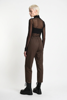 LA HAINE INSIDE US brown carrot-fit trousers, rear three-quarter view
