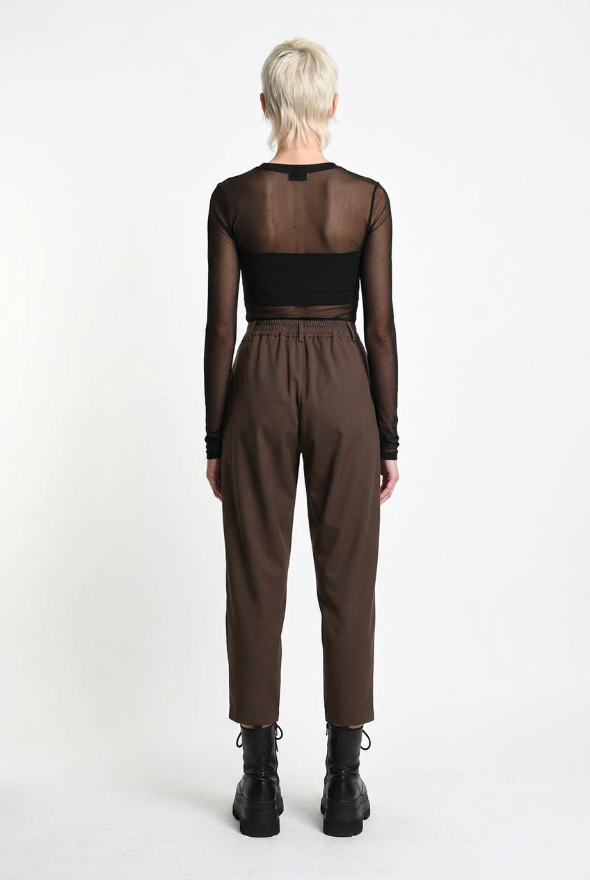 LA HAINE INSIDE US brown carrot-fit trousers, full-length back view