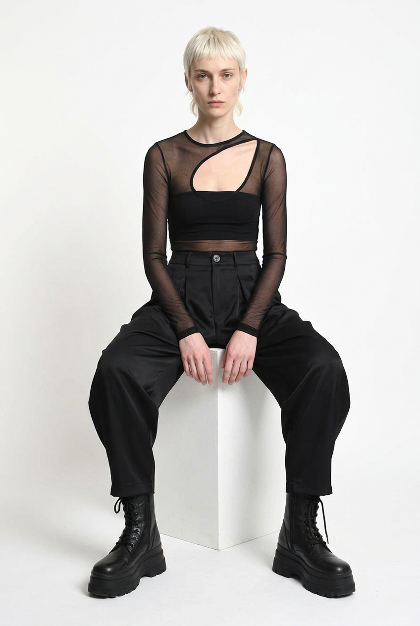 LA HAINE INSIDE US W5469 satin balloon trousers in black — seated editorial view