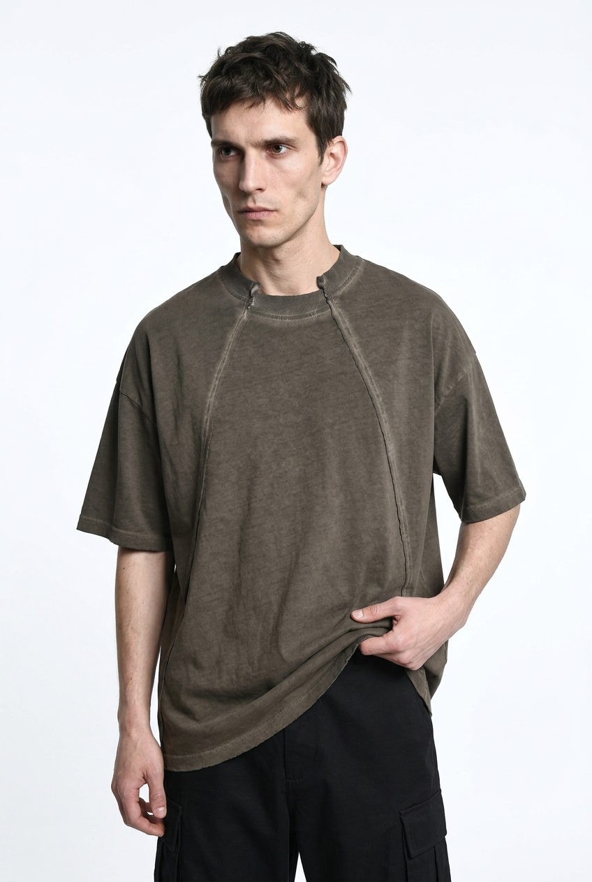 LA HAINE INSIDE US M1295 Mud cold-dyed cotton T-shirt, front view holding hem to show drape