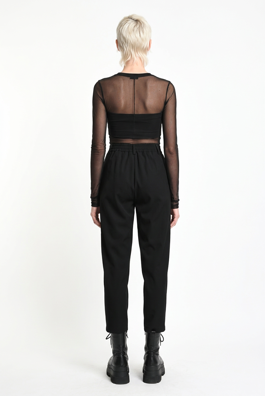 LA HAINE INSIDE US black carrot-fit trousers, full-length back view